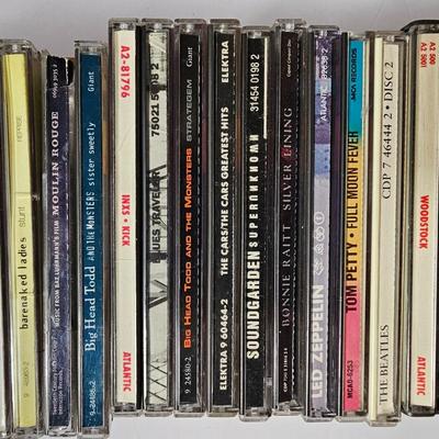 Assortment of music on CD in wood box with Sony Portable cd player