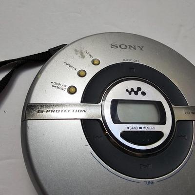 Assortment of music on CD in wood box with Sony Portable cd player