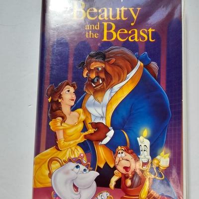 Panasonic Video Cassette Recorder VHS player VCR with an assortment of collectible Disney tapes