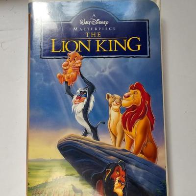 Panasonic Video Cassette Recorder VHS player VCR with an assortment of collectible Disney tapes