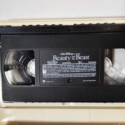 Panasonic Video Cassette Recorder VHS player VCR with an assortment of collectible Disney tapes