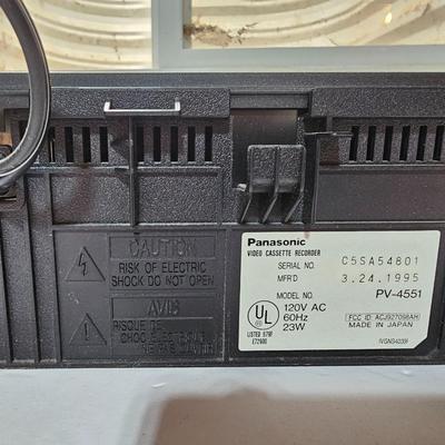 Panasonic Video Cassette Recorder VHS player VCR with an assortment of collectible Disney tapes