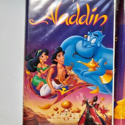 Panasonic Video Cassette Recorder VHS player VCR with an assortment of collectible Disney tapes