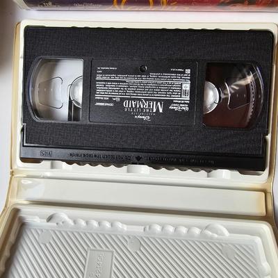 Panasonic Video Cassette Recorder VHS player VCR with an assortment of collectible Disney tapes