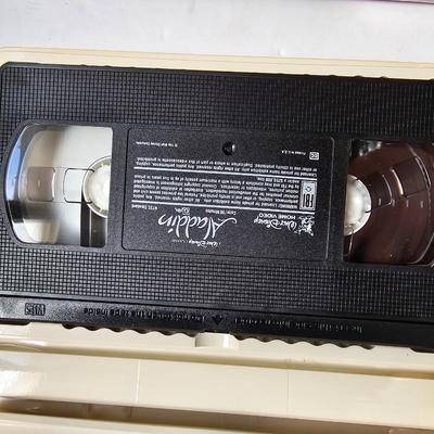Panasonic Video Cassette Recorder VHS player VCR with an assortment of collectible Disney tapes