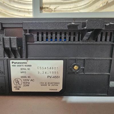 Panasonic Video Cassette Recorder VHS player VCR with an assortment of collectible Disney tapes