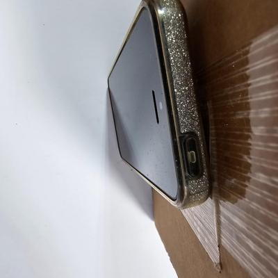 Assortment of small electronics - Garmin - Apple phones - Lg phone - Pager - Ipod and more
