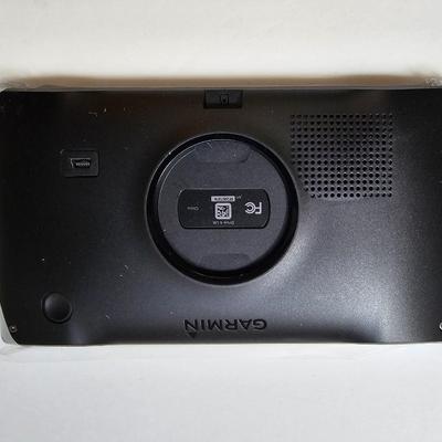 Assortment of small electronics - Garmin - Apple phones - Lg phone - Pager - Ipod and more