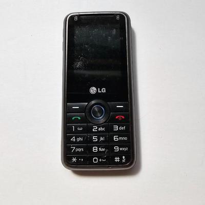 Assortment of small electronics - Garmin - Apple phones - Lg phone - Pager - Ipod and more