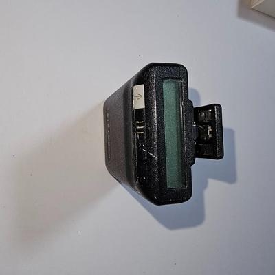 Assortment of small electronics - Garmin - Apple phones - Lg phone - Pager - Ipod and more