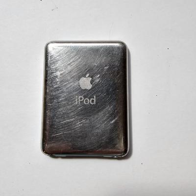 Assortment of small electronics - Garmin - Apple phones - Lg phone - Pager - Ipod and more