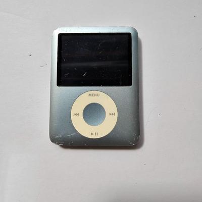 Assortment of small electronics - Garmin - Apple phones - Lg phone - Pager - Ipod and more