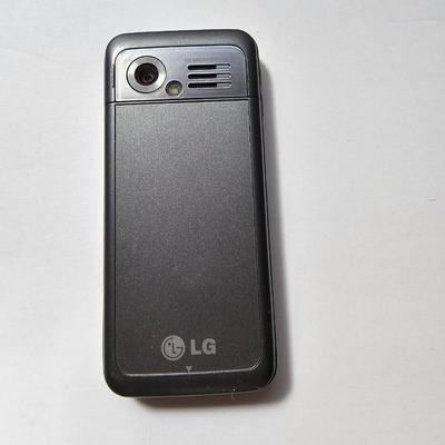 Assortment of small electronics - Garmin - Apple phones - Lg phone - Pager - Ipod and more