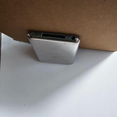 Assortment of small electronics - Garmin - Apple phones - Lg phone - Pager - Ipod and more
