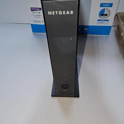 Netgear N300 Wireless router with Logitech wireless mouse
