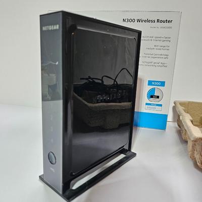 Netgear N300 Wireless router with Logitech wireless mouse