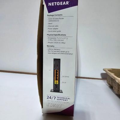 Netgear N300 Wireless router with Logitech wireless mouse