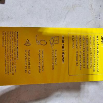Learn a different language this year! Rosetta Stone Portugues or French for Dummies - French books