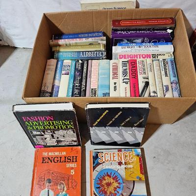 A large box of mostly hard-back books