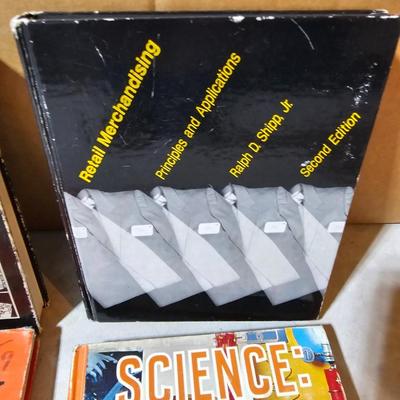 A large box of mostly hard-back books