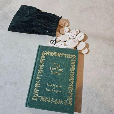 The healing Runes Ralph H. Blum and Susan Loughan with clay Runes in a bag