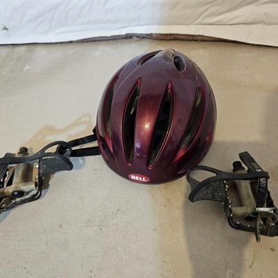 Nice Bell Bicycle helmet and a pair of bike pedals