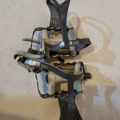 Nice Bell Bicycle helmet and a pair of bike pedals