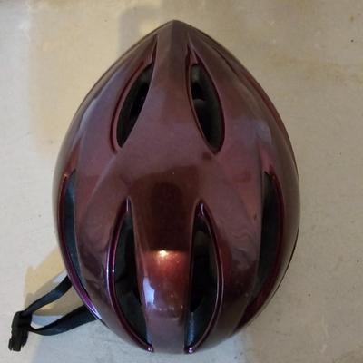 Nice Bell Bicycle helmet and a pair of bike pedals