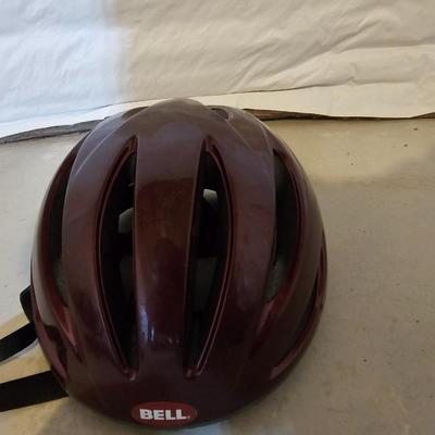 Nice Bell Bicycle helmet and a pair of bike pedals
