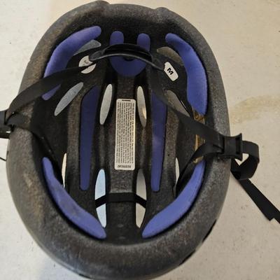 Nice Bell Bicycle helmet and a pair of bike pedals
