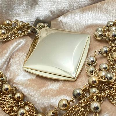 LOT 311: Vintage Jewelry - Larex Swiss Wind-up Necklace Watch, Coro Locket Brooch / Pin and Earrings