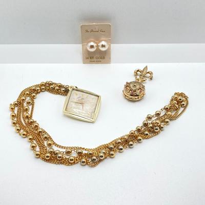 LOT 311: Vintage Jewelry - Larex Swiss Wind-up Necklace Watch, Coro Locket Brooch / Pin and Earrings