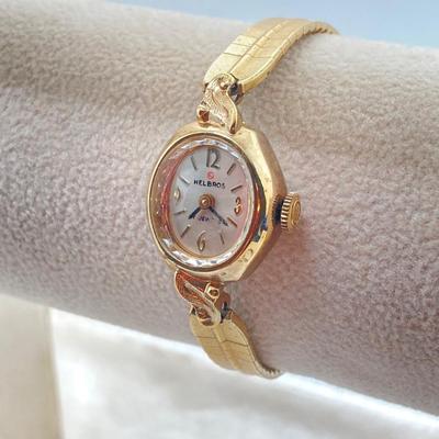 LOT 315: Vintage Gold Filled Waltham and Helbros Watches