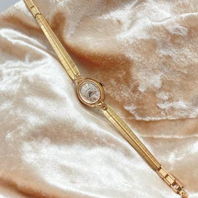 LOT 315: Vintage Gold Filled Waltham and Helbros Watches