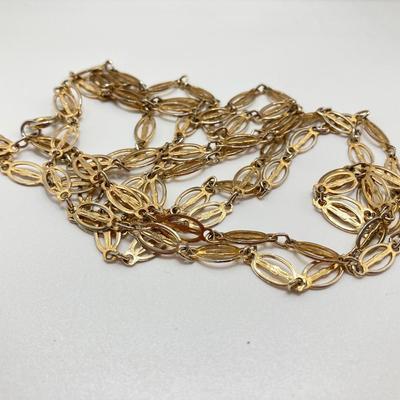 LOT 318: Vintage Uhrex Desk Clock with Collection of Gold Tone and Silver Tone Necklaces