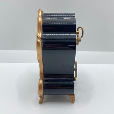 LOT 318: Vintage Uhrex Desk Clock with Collection of Gold Tone and Silver Tone Necklaces