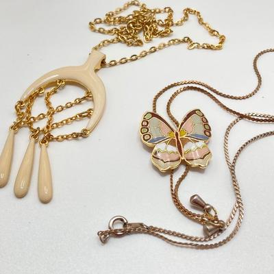 LOT 318: Vintage Uhrex Desk Clock with Collection of Gold Tone and Silver Tone Necklaces