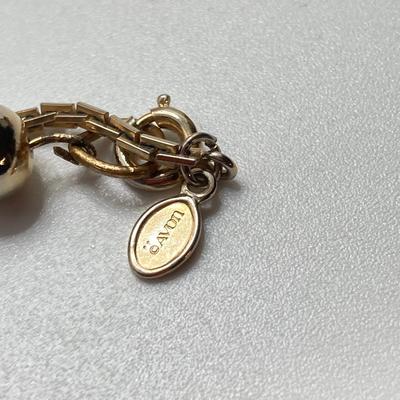 LOT 318: Vintage Uhrex Desk Clock with Collection of Gold Tone and Silver Tone Necklaces