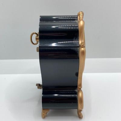 LOT 318: Vintage Uhrex Desk Clock with Collection of Gold Tone and Silver Tone Necklaces