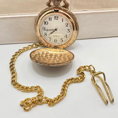 LOT 318: Vintage Uhrex Desk Clock with Collection of Gold Tone and Silver Tone Necklaces