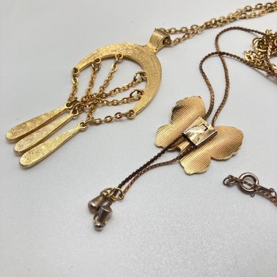 LOT 318: Vintage Uhrex Desk Clock with Collection of Gold Tone and Silver Tone Necklaces