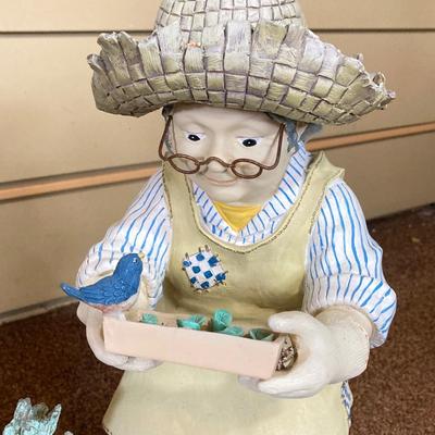 LOT 601225: Garden Decor - Metal Heron, Resin Hanging Planter and Statue "so you think this is a salad bar?"