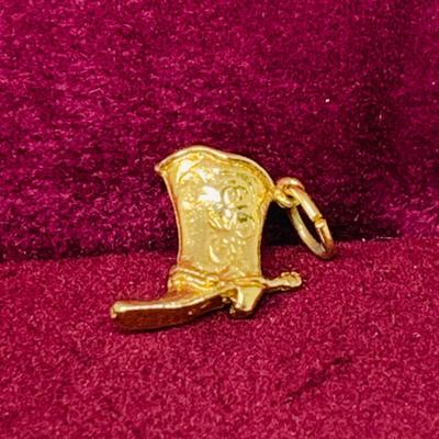 Lot 298: Gold-tone Charm Holder with 23” Chain and Unmarked and 12k GF Charms