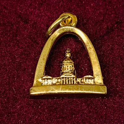 Lot 298: Gold-tone Charm Holder with 23” Chain and Unmarked and 12k GF Charms