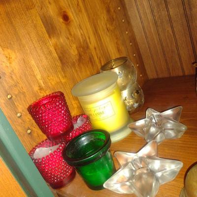 Collection of Candles and Candleholders