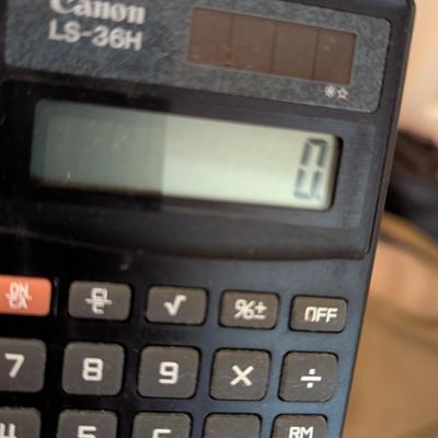 Assortment Of Handbags & Pocket Calculators