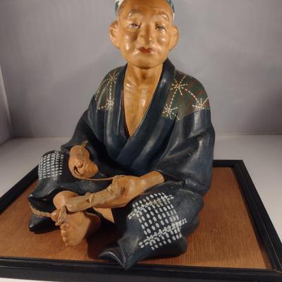 Vintage Japanese Clay Figurine with Mat- Shoe Maker (#14). (K)