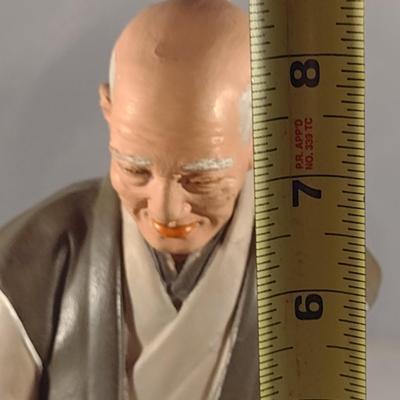 Vintage Hakata Urasaki Japanese Clay Figurine with Mat- Man Sitting (#13). (K)