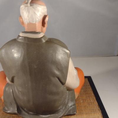 Vintage Hakata Urasaki Japanese Clay Figurine with Mat- Man Sitting (#13). (K)
