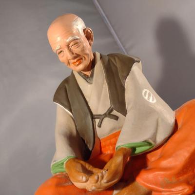 Vintage Hakata Urasaki Japanese Clay Figurine with Mat- Man Sitting (#13). (K)